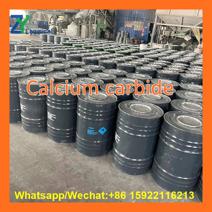 Standard export steel drums neatly stacked in the warehouse of a professional Chinese calcium carbide manufacturer.