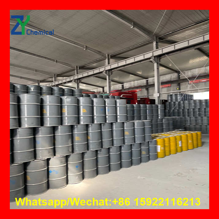 Factory interior displaying organized storage of calcium carbide for fruit ripening, with ZY Chemical and contact +86 15922116213.