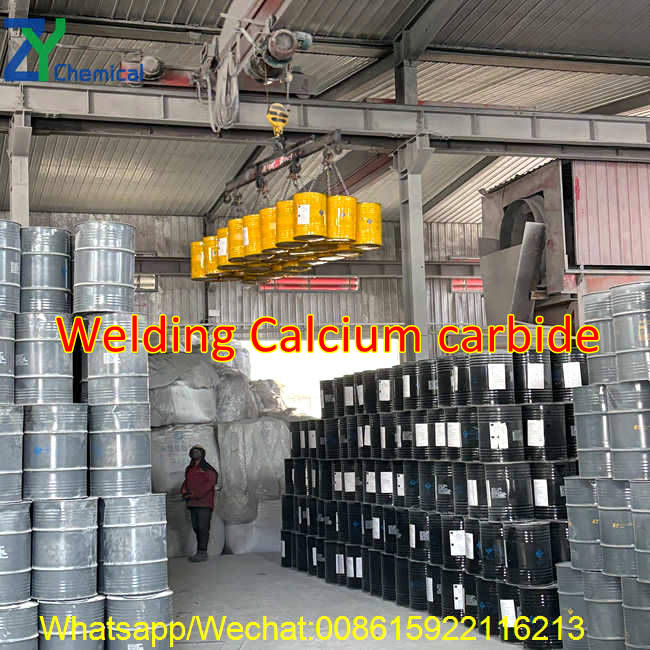 Streamlined warehouse operations showing safe crane lifting of high-quality welding calcium carbide drums for efficient logistics.