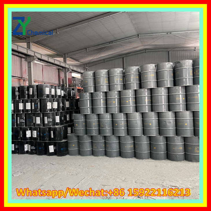 Stacks of tightly packed metal barrels inside the warehouse ready for export to ensure the best calcium carbide price per kg.