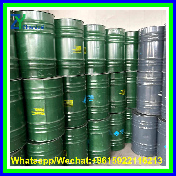 Durable 100kg and 50kg steel drums stacked for the industrial use of calcium carbide in steelmaking and acetylene gas production.
