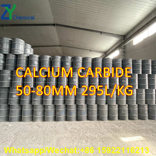 Calcium carbide packaging drums neatly stacked like walls within the warehouse workshop demonstrate the supplier's capacity for large-scale, standardized warehouse management.